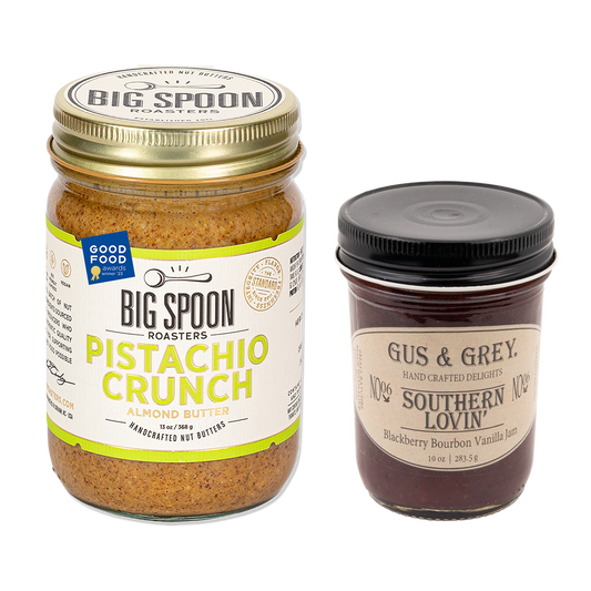 Jar of Pistachio Crunch Almond Butter with jar of Gus & Grey Blackberry Bourbon Vanilla Jam