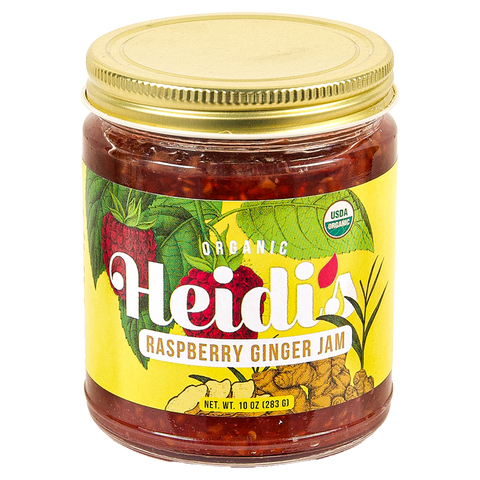 10 oz glass jar of Heidi's Raspberry Ginger Jam with bright yellow label showing drawn raspberries and ginger