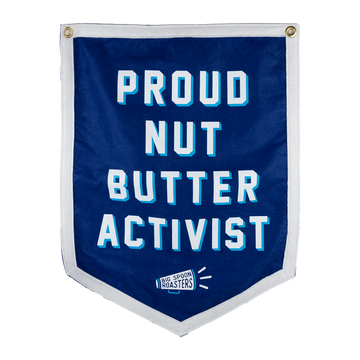 Blue Camp Flag reading PROUD NUT BUTTER ACTIVIST with a megaphone reading BIG SPOON ROASTERS at the bottom center