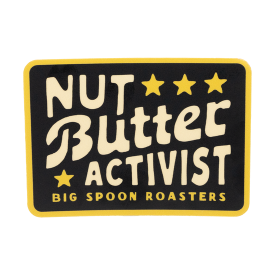 Black sticker reading NUT BUTTER ACTIVIST | BIG SPOON ROASTERS