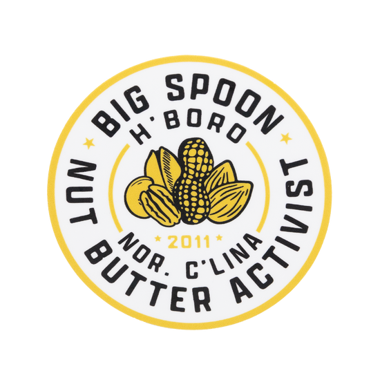 Round sticker reading BIG SPOON NUT BUTTER ACTIVIST | H'BORO NC