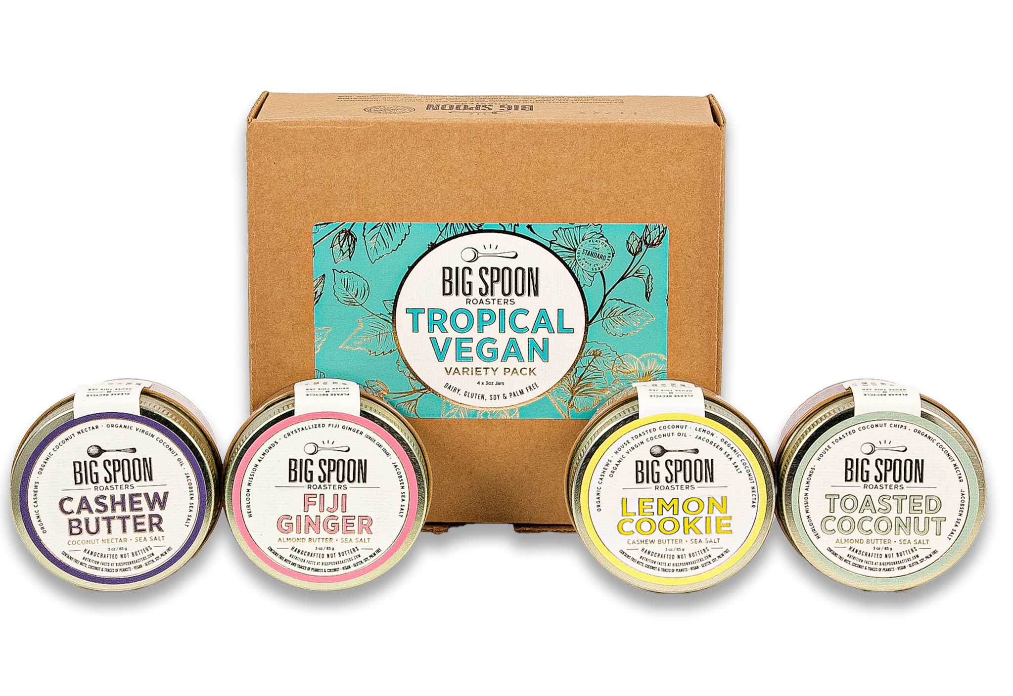 3oz Jars of Cashew Butter, Fiji Ginger, Lemon Cookie, Toasted Coconut in front of Tropical Vegan gift box