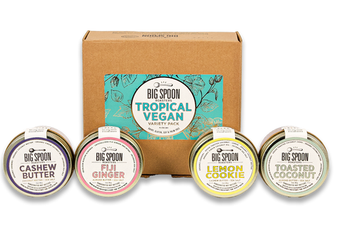 3oz Jars of Cashew Butter, Fiji Ginger, Lemon Cookie, Toasted Coconut in front of Tropical Vegan gift box