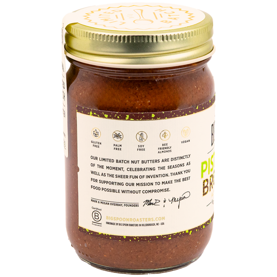Jar of Pistachio Brownie Almond Butter showing value props and a short blurb about Big Spoon Roasters