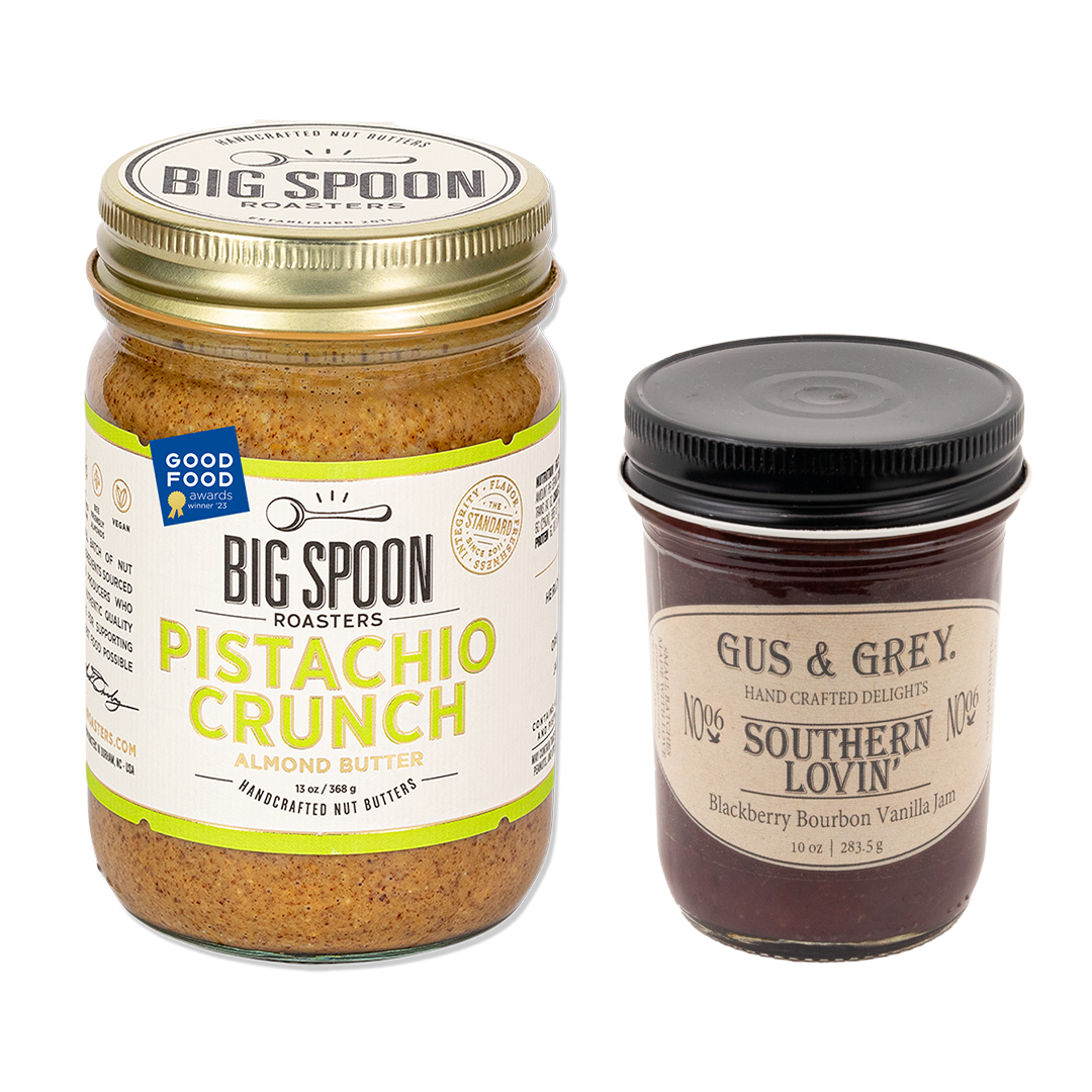 Jar of Pistachio Crunch Almond Butter with jar of Gus & Grey Blackberry Bourbon Vanilla Jam 