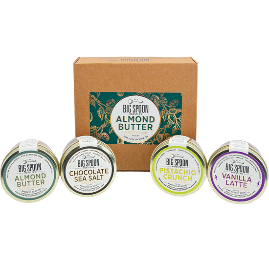 Collection of Big Spoon Almond Butter containers with a branded box on a white background