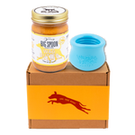 Jar of Vanilla Tater Wag Butter and an aqua West Paw Toppl toy on top of a gift box