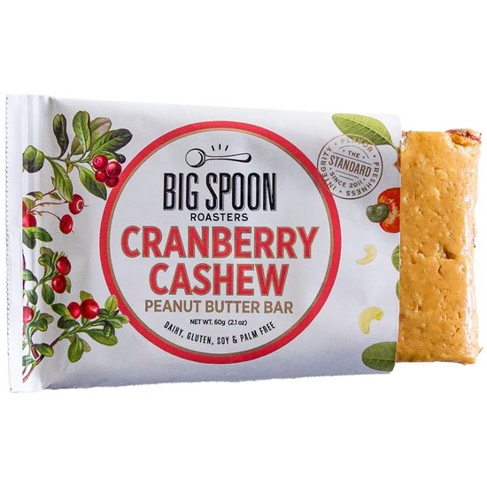 Cranberry Cashew Bar package, with right side open showing partial bar