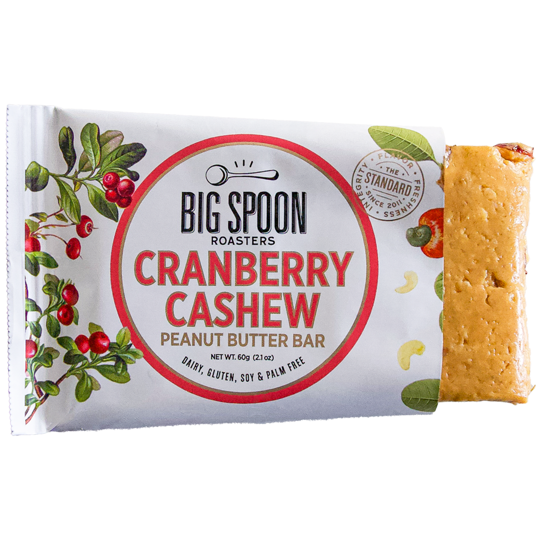 Cranberry Cashew Bar package, with right side open showing partial bar