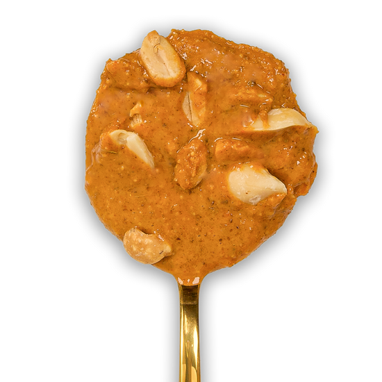 Lum Lum Thai Curry Peanut & Cashew Butter on a golden spoon