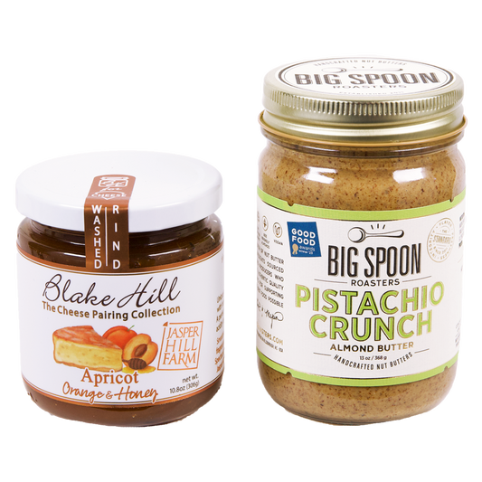 jar of Apricot jam next to a 13oz jar of Pistachio Crunch Almond Butter