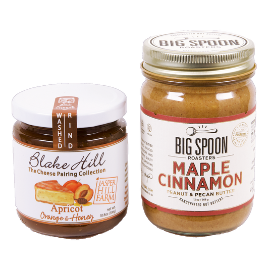 jar of Apricot jam next to a 13oz jar of Maple Cinnamon Peanut Pecan Butter