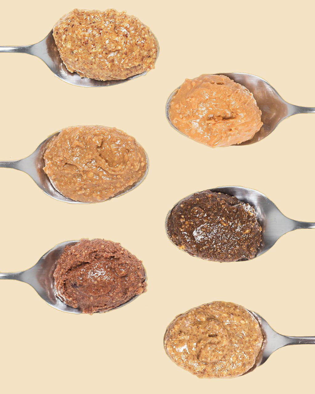 Six spoons stacked with Big Spoon Roasters nut butter