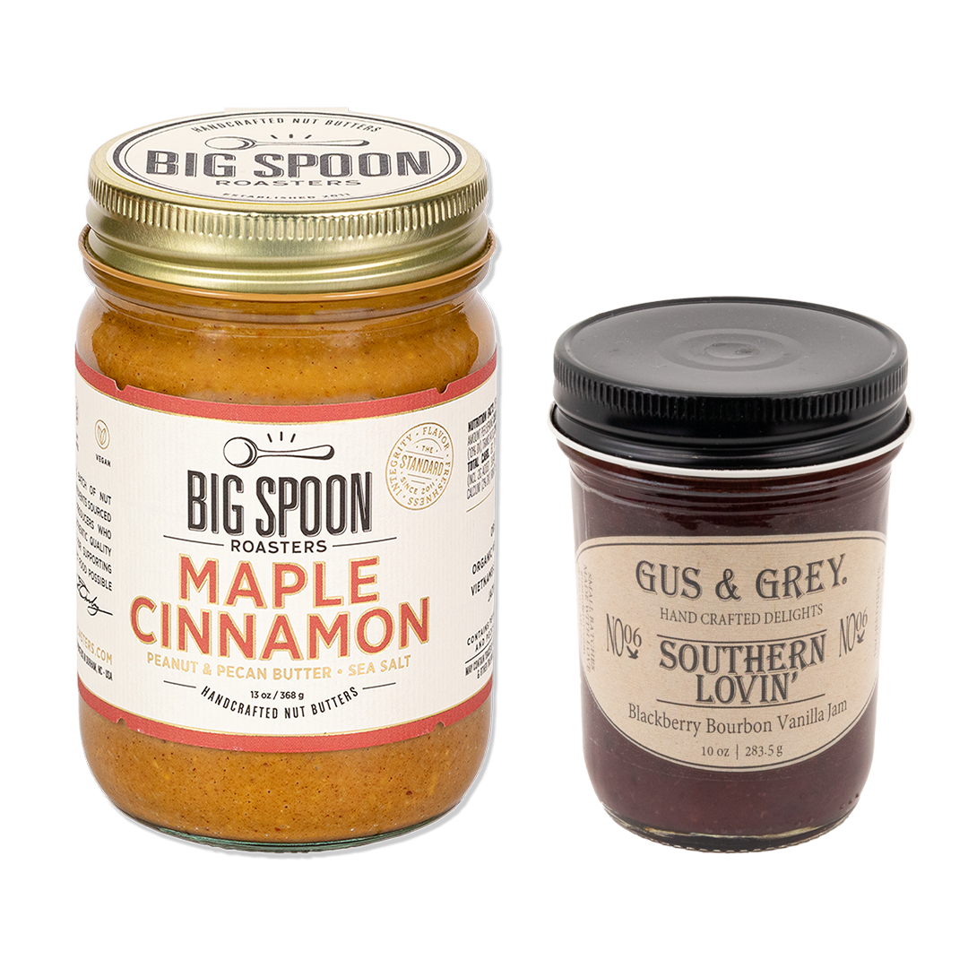 Jar of Maple Cinnamon Peanut & Pecan Butter + Sea Salt with a jar of Gus & Grey Blackberry Bourbon Vanilla Jam 