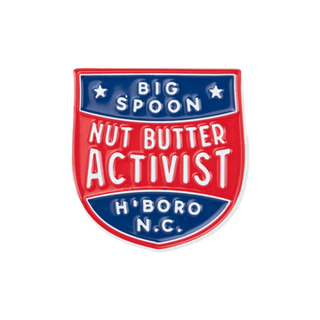 pin reading "BIG SPOON NUT BUTTER ACTIVIST H'BORO NC"