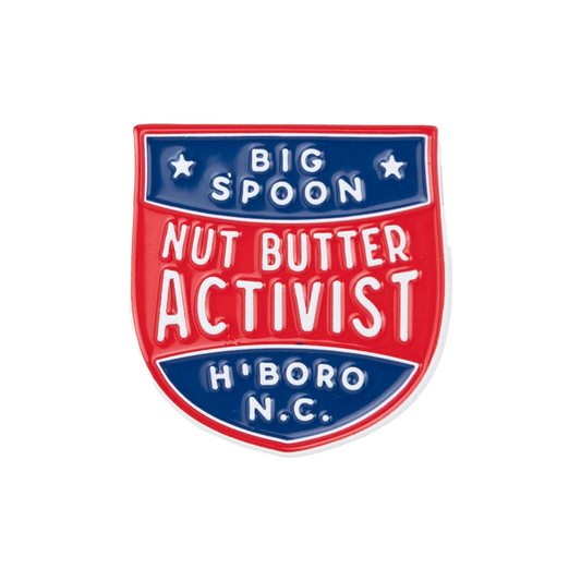 pin reading "BIG SPOON NUT BUTTER ACTIVIST H'BORO NC"