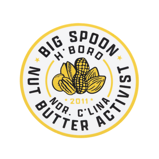 Round sticker reading BIG SPOON NUT BUTTER ACTIVIST | H'BORO NC