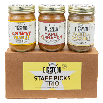 Staff Picks Nut Butter Trio box with three jars—Crunchy Peanut Butter, Maple Cinnamon Peanut & Pecan Butter, and Vanilla Caramel Almond & Cashew Butter—atop.